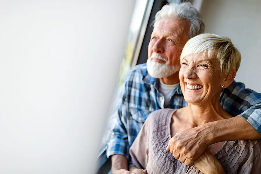 Elderly couple smiling